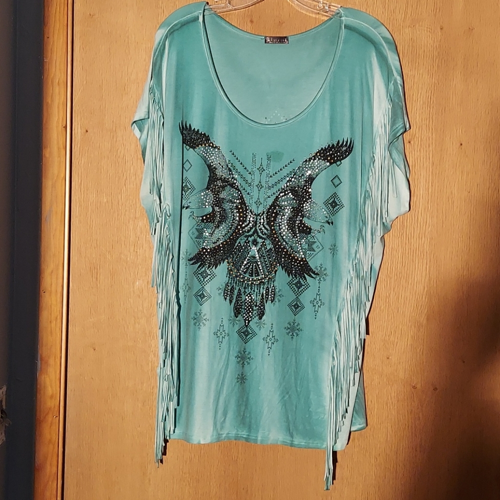 Turquoise top with beautiful embellishments